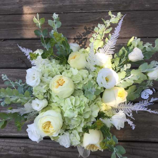 White and pale yellow bouquet with hydrangeas and roses