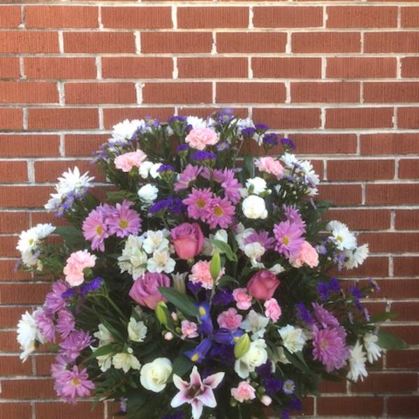Large mixed floral spray with pink, white, and purple blooms