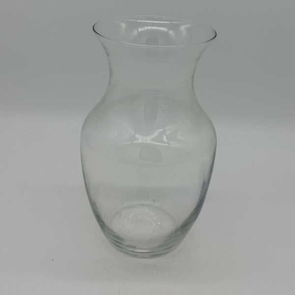 Clear glass vase with a flared rim and narrow neck