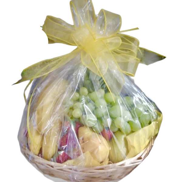 Gift basket wrapped in clear cellophane with a yellow bow