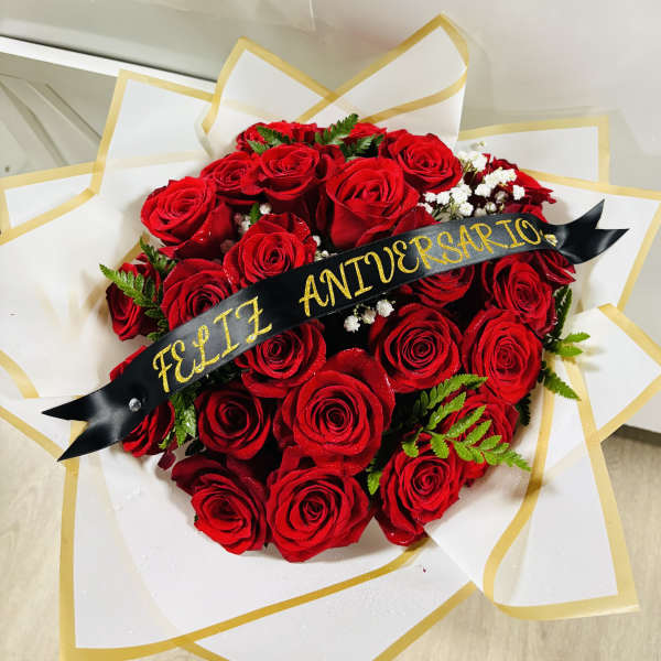 Red rose bouquet with a black anniversary ribbon