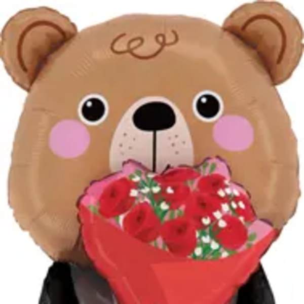 Bear-shaped balloon holding a bouquet of red flowers