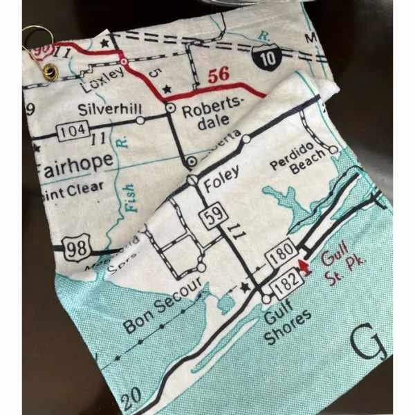 Folded fabric pouch printed with a road map pattern