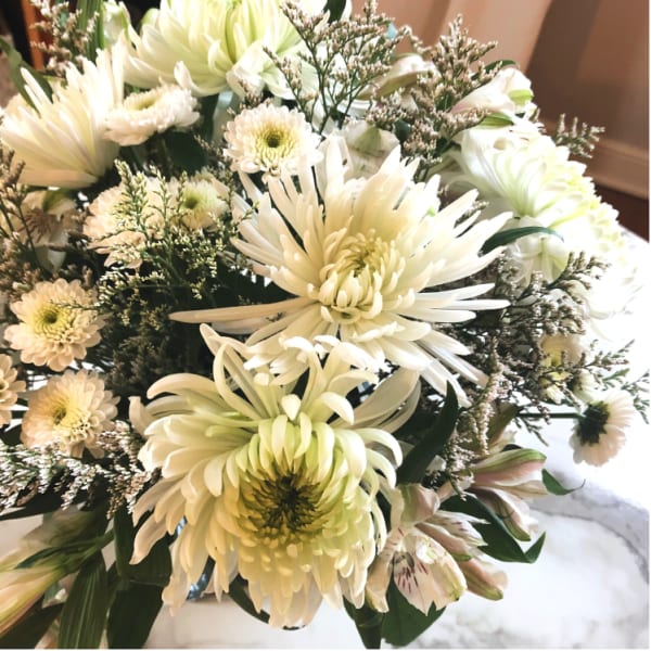 Creamy white chrysanthemum bouquet with small filler flowers