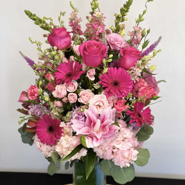 Pink mixed bouquet in a clear glass vase