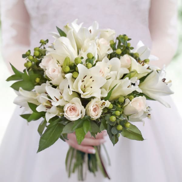 White bouquet with lilies and pale pink roses