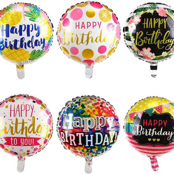 Six round birthday balloons with colorful printed designs