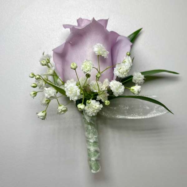 Lavender rose boutonniere with white baby's breath and ribbon wrap