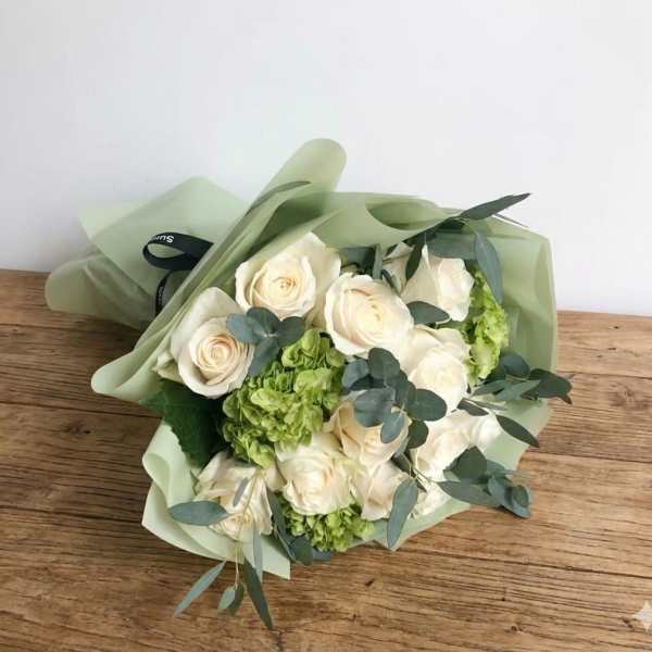 Dozen handtied white roses