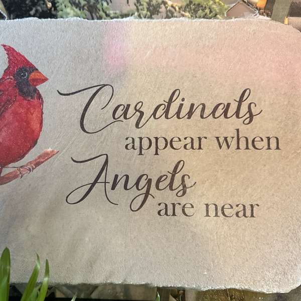 Decorative stone plaque with a cardinal and the words "Cardinals appear when Angels are near"