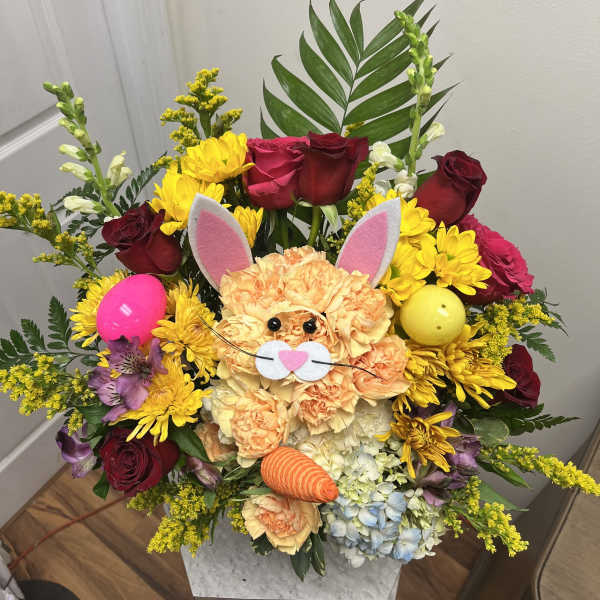 Colorful bouquet with a bunny face and Easter eggs