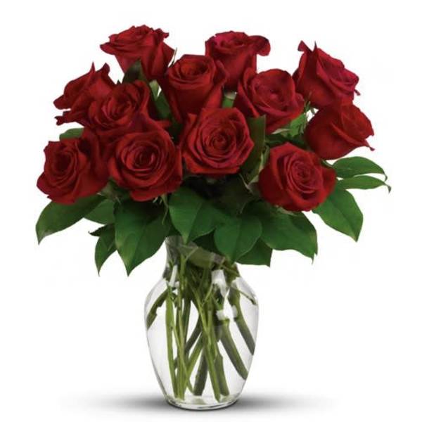 Bouquet of red roses in a clear glass vase