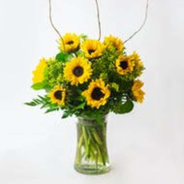Sunflower bouquet in a clear glass vase