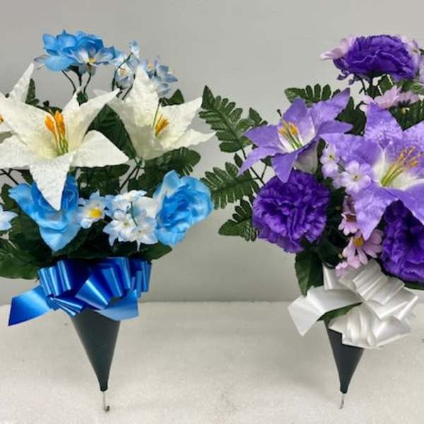 Two cone-shaped floral bouquets with blue-white and purple-white flowers