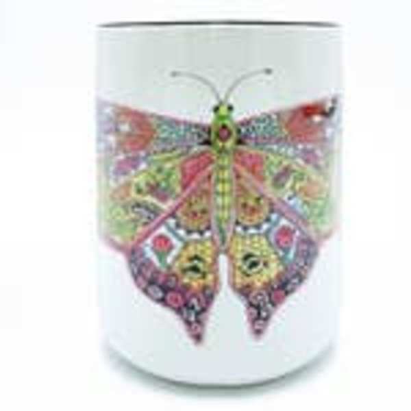Decorative butterfly design on a white cylindrical container