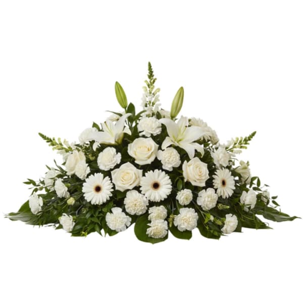 White floral spray with lilies, roses, and daisies