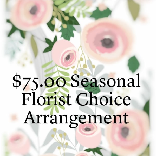 Seasonal florist choice arrangement with pink flowers and green foliage