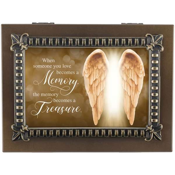 Memorial plaque with angel wings and a sympathy quote
