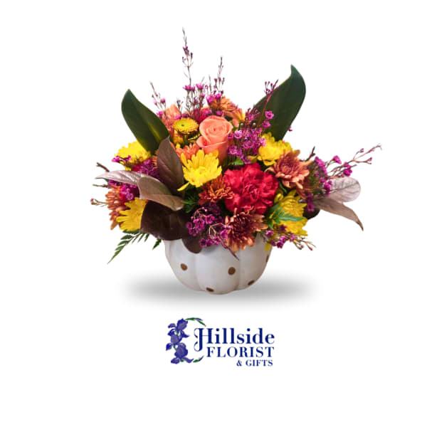 Mixed bouquet in a white pumpkin-shaped container
