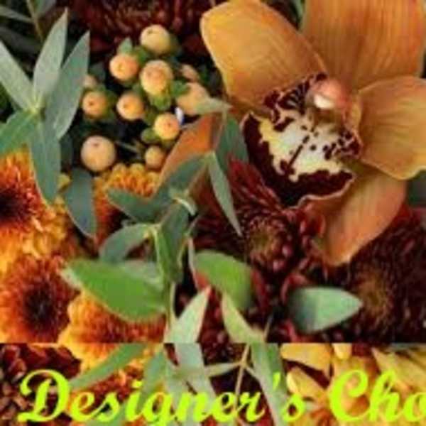 Orange orchid and autumn mums with eucalyptus foliage