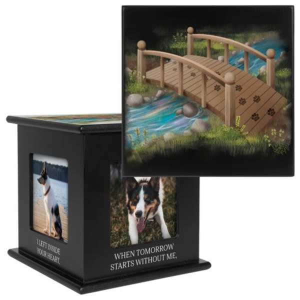 Black memorial keepsake box with dog photos and a painted bridge lid
