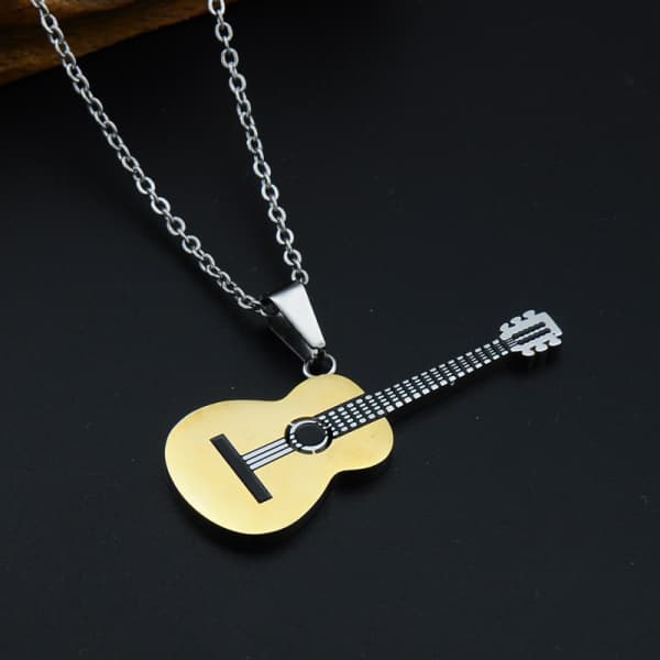 Guitar-shaped pendant necklace on a black background