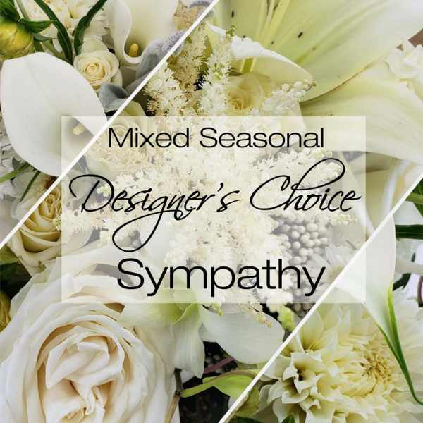 Cream and white sympathy bouquet with roses, lilies, and calla lilies
