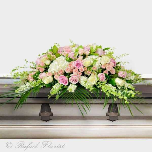 Green hydrangeas, pink roses , orchids and more casket spray