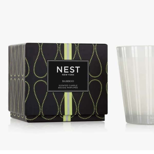 Scented candle in a glass tumbler with its box