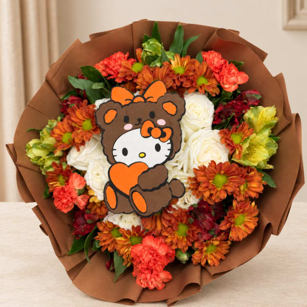 Bouquet of orange and white flowers wrapped in brown paper with a Hello Kitty topper