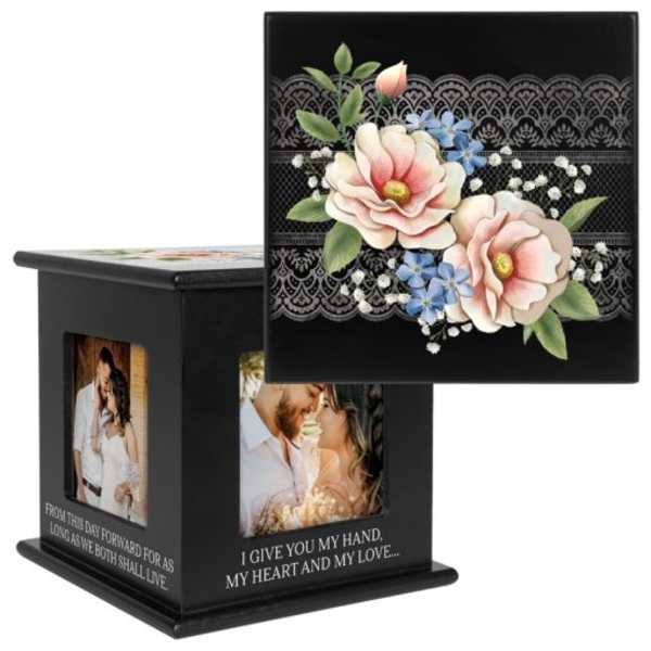 Black memorial box with floral lid and couple photos