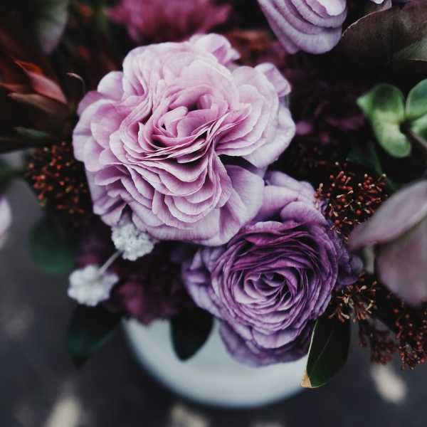 Bouquet of lavender and purple ranunculus in a vase