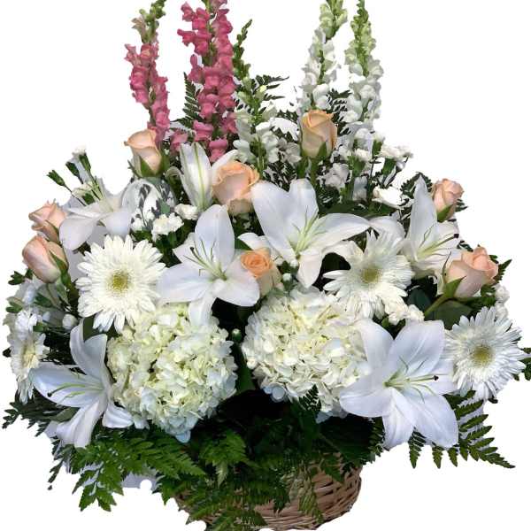 Basket arrangement of white lilies, roses, and daisies with pink snapdragons