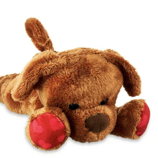 Plush brown dog toy with red paws on a white background