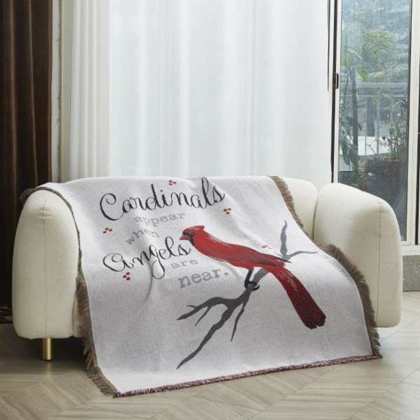 Blanket with a red cardinal and the words "Cardinals appear when angels are near"