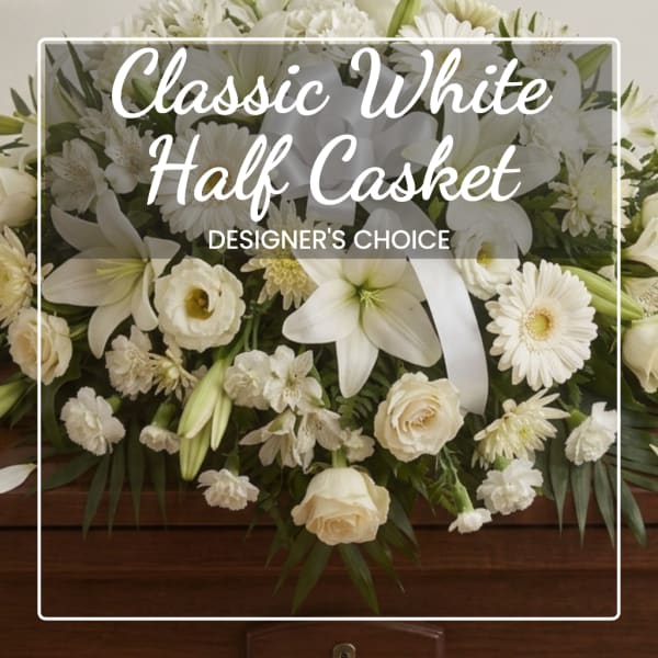 White casket spray with lilies, roses, and daisies