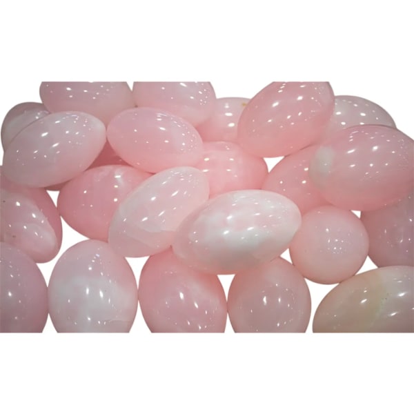 Cluster of pale pink polished stones on a white background