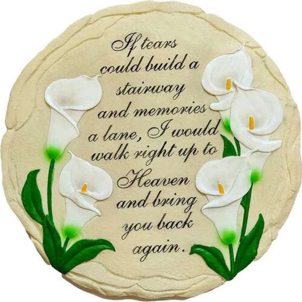 Round memorial plaque with white calla lilies and a sympathy quote