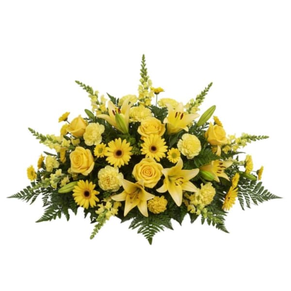 Yellow floral centerpiece with roses, lilies, and daisies