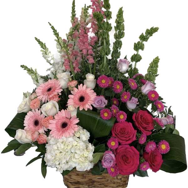 Basket arrangement with pink and white flowers, roses, gerberas, and tall snapdragons
