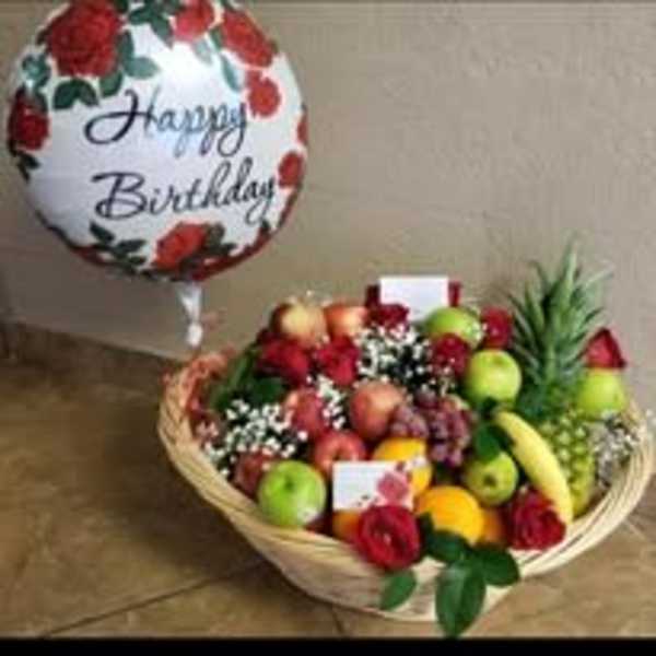 Fruit basket with a birthday balloon