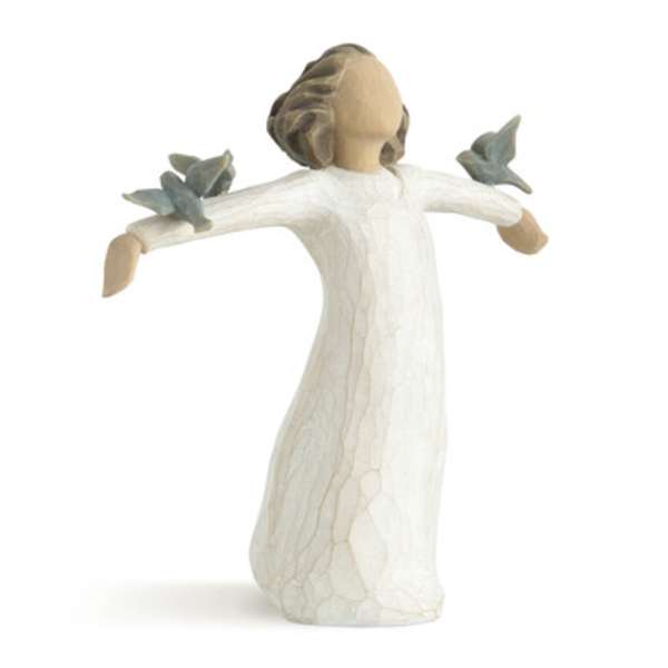 Wooden angel figurine with outstretched arms and small bird accents