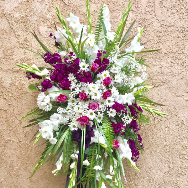 Tall standing floral spray with white and purple flowers
