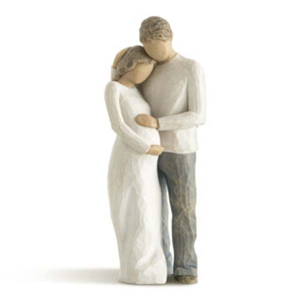 Carved figurine of a couple embracing