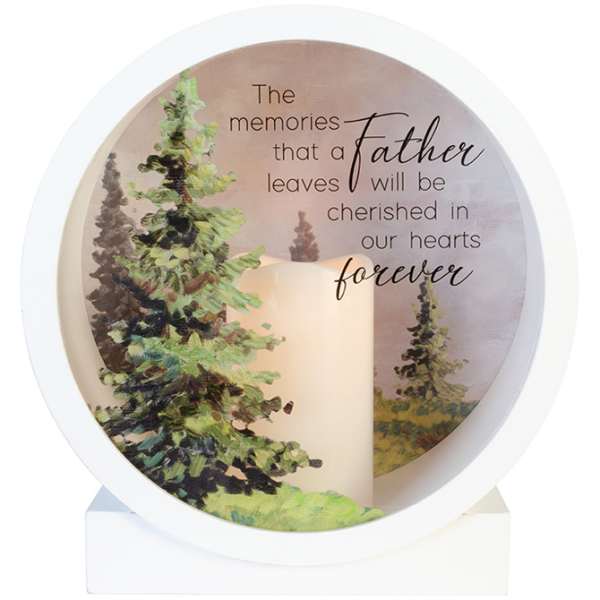 Memorial candle with a father remembrance message and forest scene