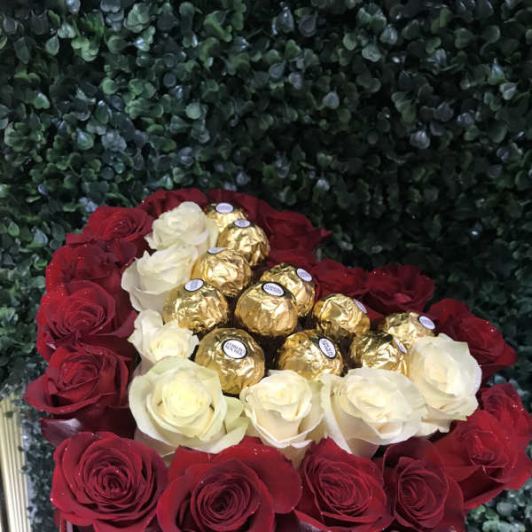 Heart-shaped rose arrangement with Ferrero Rocher chocolates