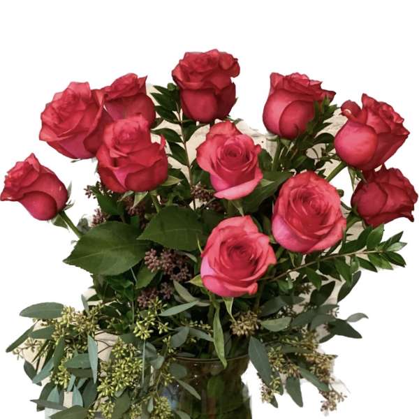 Pink rose bouquet in a clear glass vase