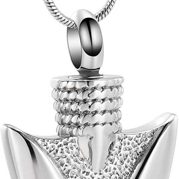Silver arrowhead pendant necklace on a white background