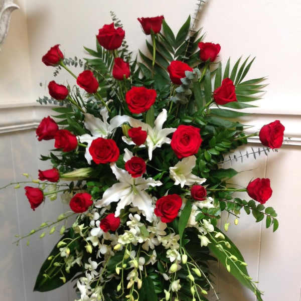 Standing floral spray with red roses and white lilies