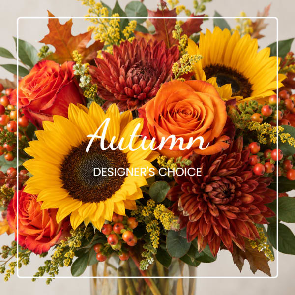 Autumn bouquet with sunflowers, orange roses, and burgundy mums
